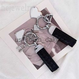Key Rings Luxury designer keychain black leather key chain exquisite handmade car bag charms necktie contour metal grace fashion wallet key ring heart triangle PJ05