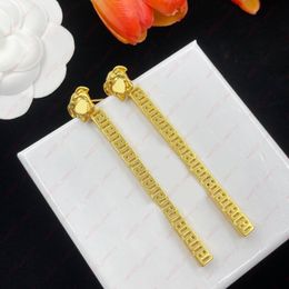 Brass material Dangle & Chandelier Earrings, Interlocking Textured Pen Earrings for Women, Fashion Designer jewelry, personalized earplugs, Party