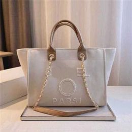 Cheap 80% Off Luxury Women's Classic Hand Canvas Beach Bag Tote Handbags Large Backpacks Capacity Small Chain Packs Big Crossbody 82EU code 561