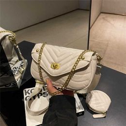 2023 Cross body French textured mesh red one shoulder designed by female niche chain small fragrance embroidered thread mother and child bag model 542