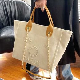 Cheap 80% Off Luxury Women's Hand Canvas Beach Bag Tote Handbags Classic Large Backpacks Capacity Small Chain Packs Big Crossbody code 561