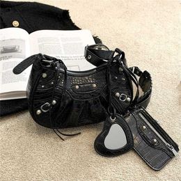 50% off clearance sale 2023 New Spicy Girl Half Month Rivet Three in One Crossbody Locomotive Female Underarm Bag model 542