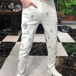 Hip Hop Skinny White Pencil Pants 2022 News Streetwear Slim zipper Men Jeans Homme Diamonds Skull Style Male Biker Patch Pant 29-3218Z