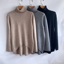 toteme High Neck, Loose-fit, Bottomed Over A Pullover Sweater