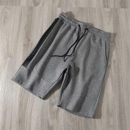 Pantaloni da uomo Pantaloncini sportivi Tessuto casual traspirante Cinque pantaloncini259Q