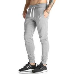 New Trend Men full sportswear Pants Casual Elastic Mens Fitness Workout Pants Males skinny Sweatpants Trousers Jogger Pants204c