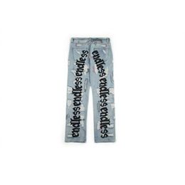 Endless Embroidery Denim Pants Rocky Jeans Art Letter Broken Holes Wash Do Old Fashion Men Women Jean Trousers C0401226S