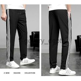 Pantaloni da uomo pantaloni da uomo tracce di tuta da uomo Seluar Lelaki Sport Pants Men Cash Seluar Lelaki Black Seluar Traccia Lelaki Seluar Lelaki Elasticità Panelli della tuta Plus J230918