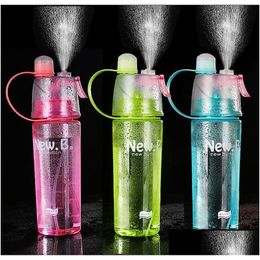 Water Bottles Creative Spray Sports Bottle 600Ml Portable Outdoor Sport Kettle Anti-Leak Drinking Cup With Mist Hydration Drop Deliver Dhlso