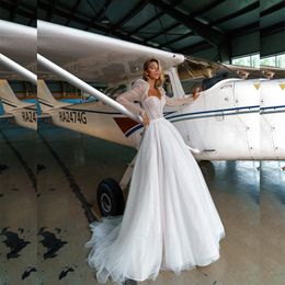 فستان الزفاف الكلاسيكي في غرب بوهو مع فستان زفاف بلينغ مشد على الأكمام الطويلة