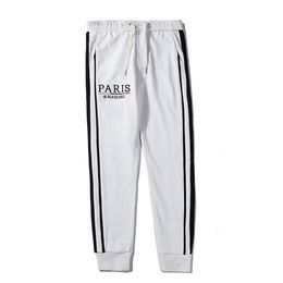 Mens Luxury Jogger Pants Branded Drawstring Sports Pants High Fashion Black White Colours Side Stripe Designer Joggers208M