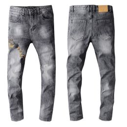 Latest Listing Design Winter Mens Jeans Blue Good Quality Designer Spray Paint Spliced Ripped High Street Destroyed Denim Trousers3289