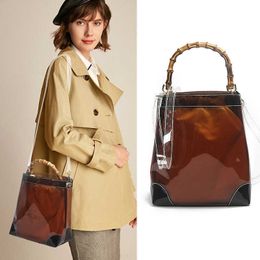 Perspective Spinning Fabric Mother Bag 2023 Autumn New Bamboo Wrist Colored Transparent Bucket Bag Present 230919