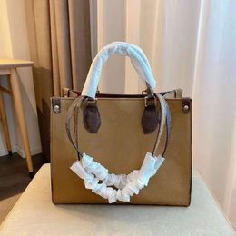 2024 two color handbag with quality fabric single shoulder bag super shopping bag highend atmosphere fashionable and versatile