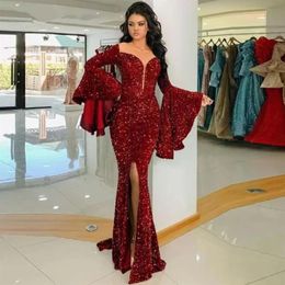 2022 New Elegant Arabic Dubai Burgundy Mermaid Evening Dresses Jewel Neck Sequins Puffy Long Sleeves High Split Sweep Train Formal187G