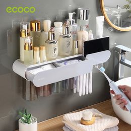 Toothbrush Holders ECOCO Magnetic Adsorption Inverted Toothbrush Holder Automatic Toothpaste Squeezer Dispenser Storage Rack Bathroom Accessories 230921
