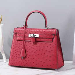 A kaily Luxury Bag women's Ostrich leather bag Leather goods Latch cross body handbag Mini