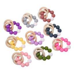 1Pcs Food Grade Colourful Baby Silicone Bracelet Rattle Toys Wooden Teether Round Ring For Baby Nursing Molar Teething Wristband