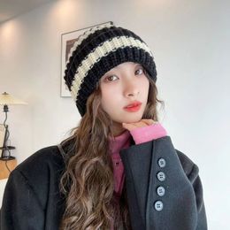 Korean version of the autumn and winter knitted hat stripes warm heart fashion with a small minority princess small fragrance and foreign air bag ear warm explosion