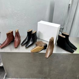 Autumn and Winter New Simple Small Flat Head Short Boots with a High Grade and Minimalist Style, and a Simple Shoe Shape