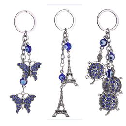 Key Rings Blue Evil Eye Keychain Ring Jewellery Tortoise Eiffel Tower Keyring Fashion Animals Butterfly Charms Chain Holder For Handbags Dhnwt