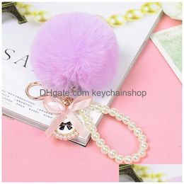 Key Rings Pearl Pompoms Jewelry Fluffy Rabbit Fur Ball Keychain Women Fashion Creative Fuzzy Plush Keyfobs Holder Drop Delivery Dhnc4