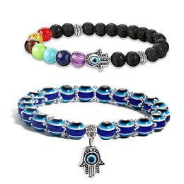 Charm Bracelets 2Pcs Evil Blue Eye Beaded Stretch Bracelet 7 Chakras Gemstone Lava Stone Hand Drop Delivery Jewellery Dhsn4