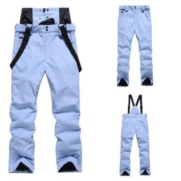 Skiing Pants Men Women Ski Pants Winter Outdoor Sports Wear Windproof Waterproof Warm Snow Trousers Ski Snowboard Bibs Pants Couples 230925