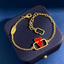 Luxury Women Jewelry Gold Bracelet Exquisite Oil Dropping Red Heart Smooth Faced Hollow Design Fashion and Minimalist Designer High end Gorgeous Lady Bracelet