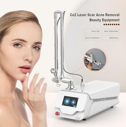 Portable Co2 Fractional Laser Machine 60w Adjustable Stretch Marks Co2 Laser Mole Removal Skin Resurfacing Laser With Ce