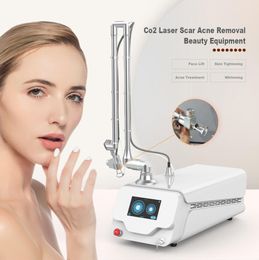 Newest Co2 Laser Acne Scar Removal Skin Tightening Fractional Co2 Laser Beauty Machine For Face Lift And Wrinkles Removal