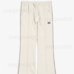 Designer pants slightly flared hipster High Street pants Butterfly embroidery purple border flared pants co-branded pants