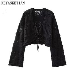 Women's Knits Tees KEYANKETIAN Autumn Women's Hollow Crochet Strap Short Sweater Boho Holiday Wind Flare Sleeve Black Crop Top Knit Cardigan 230927