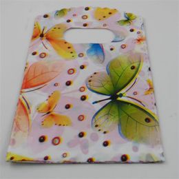 New 500pcs Shopping Butterfly Plastic Packing Gift Bag 15x9cm 235c