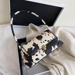 Cow pattern ladies shoulder bag PU soft leather fashionable and cute underarm bag ladder shape handbag Dot printed Purse314I