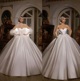 Fancy Feathers Wedding Dress Sheer Neck See Through Bridal Gowns Crystals Beaded Robe de mariee