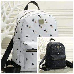 Leather Handbags High Quality 2 size men and women School Backpack famous Rivet printing Backpack Designer lady Bags Boy and Girl 245n