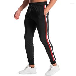 Men's Pants 2023 Fall Leisure Slim Pencil Men Fashion Striped Print Tight Trousers Mens Spring Casual Mid Waist Drawstring Sport