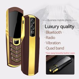 New Arrive Unlocked Golden Cell phone Classical Quad Band 2G GSM Dual sim card Business Mobile FM Radio Camera bluetooth Dial Magic Voice Cellphone with case