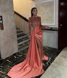 2023 Evening Dresses Wear Arabic Sexy Sequined Lace Peach Sequins Sheath High Neck Long Sleeves Side Split Floor Length Prom Gowns Vestidos Cutaway Sides