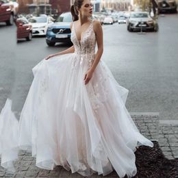 Sexy V Neck A Line Wedding Dresses With Lace Appliques Asymmetrial Train Ruched Tulle Beaded Bridal Gowns Cross Back Sleeveless Vestido De Noiva