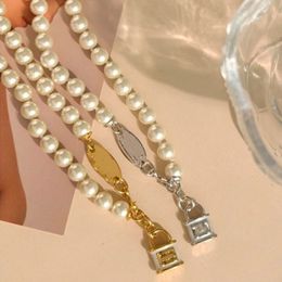 Pendant Necklaces Saturn Stereoscopic Small Lock Pendants Pearl Necklace Designer Fashion Net Red Necklace Sweater Chain Girl Love Jewelry