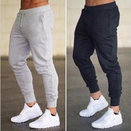 Fashion Mens Joggers Brand Casual Pants Fitness Women Sportswear Tracksuit Bottoms Skinny Sweatpants Trousers Black Gray Gyms Jogger Track Pants