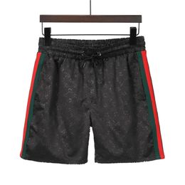 Designer 2023 estilo de tecido impermeável estilo calça de verão calças de praia shorts masculinos shorts de surf shorts baús esportivas esportivas