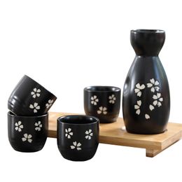 Japanese Sakura 5 Pieces Ceramic Sake Drinkware Set with 1 Tokkuri Bottle 4 Ochoko Cups for Home Restaurant Black with White Flower