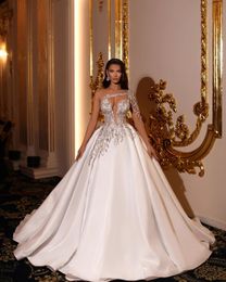 Luxury Ball Gown Wedding Dresses One Middle Sleeve Deep V Neck Sparkly Sequins Appliques Lace Pearls Lace Ruffles Formal Bridal Gowns Custom Made Vestido de novia