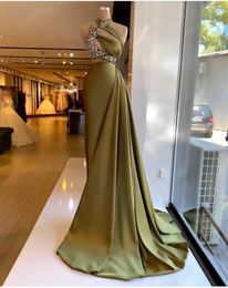 2023 Green Evening Dresses Wear Mermaid Halter Illusion Sleeveless Cutaway Sides Satin Lace Appliques Crystal Beads Plus Size Formal Party Dress Prom Gowns