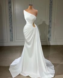 2023 Mermaid Wedding Dresses Vintage Sexy African Strapless Illusion Crystal Beaded Ruffles Cutaway Sides Long Formal Bridal Gowns Sleeveless