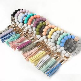 Party Favor Stock Wooden Tassel Bead String Bracelets Keychain Sile Beads Women Girl Key Ring Wrist Strap For Car Chain Wristlet Bea Dho26