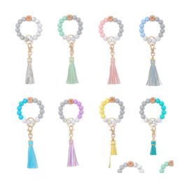 Keychains Lanyards 8 Colours Sile Bead Bracelet Keychain Female Bracelets Key Ring Tassel Wooden Beads Food Grade Girl Keyring Wris Dhwsc